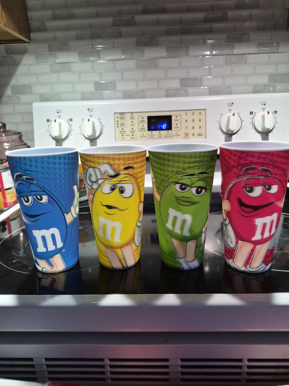 M&M'S Reusable Character Cups in Blue, Yellow, Green, Pink